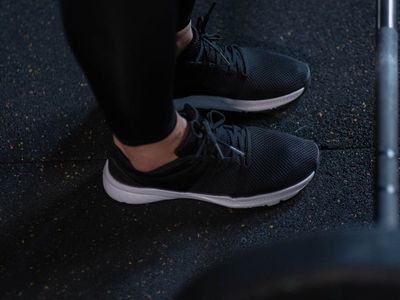 Close up of sports shoes on a professional gym floor.