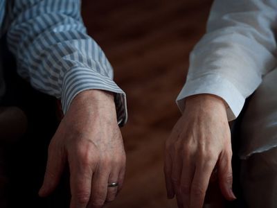Detailed shot of hands resting during a focused interval.